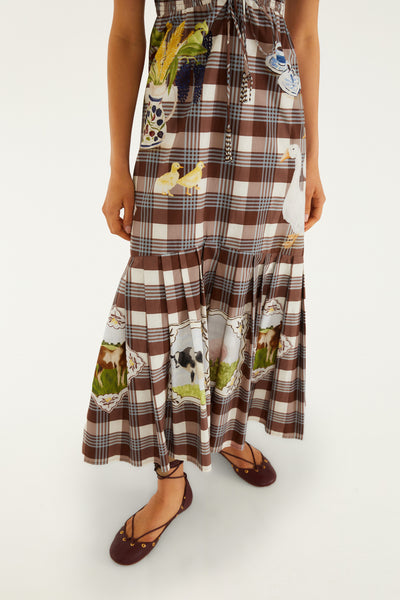 Brown multi-print midi smocked dress featuring playful farm-themed graphics, square neckline, and ruffled sleeves.