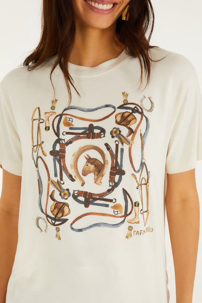 Off-white slim fit T-shirt featuring a playful equestrian print in warm terracotta, navy, and gold tones.