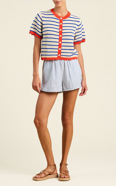 Aurora short sleeve cotton stripe cardigan in Antique White and Navy with red collar, ivory buttons, and scalloped hems