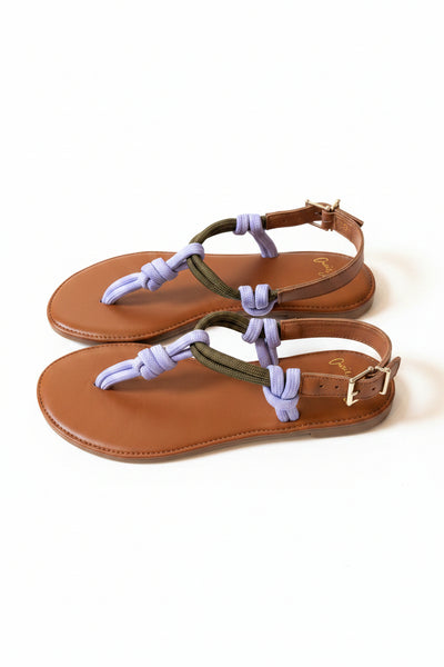 Pair of brown sandals with purple and khaki green straps on a light background | Craie Studio | idPearl Boutique New York | 