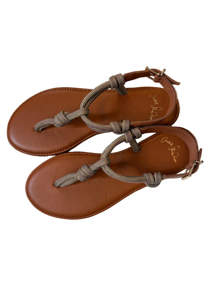 Pair of brown sandals with braided straps on a white backdrop | Craie Studio | idPearl Boutique New York
