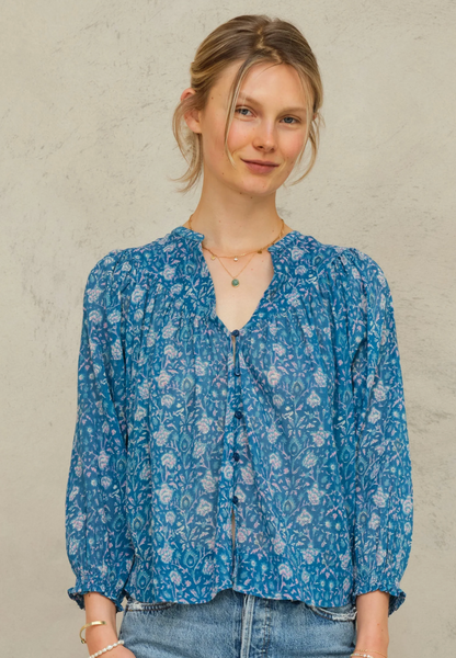 Myla Print Top in teal blue floral cotton with V-neck, button front, gathered body, and three-quarter sleeves