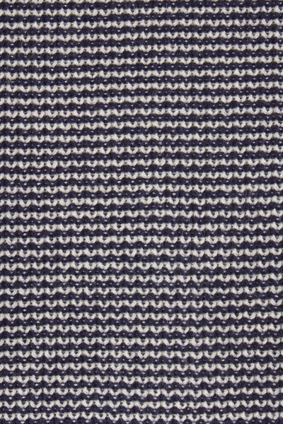 Navy and ivory striped cotton knit with interlock stitch, featuring a deep v-neckline and two front pockets.